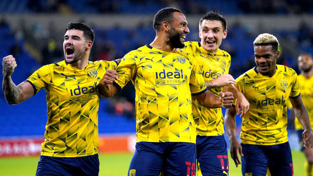 West Bromwich Albion's Matt Phillips (centre) celebrates with his team-mates after scoring their side's fourth goal of the game during the Sky Bet Championship match at the Cardiff City Stadium, Cardiff. Picture date: Tuesday September 28, 2021.