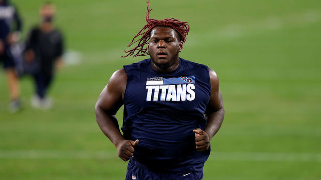 NASHVILLE, TENNESSEE - NOVEMBER 12: Isaiah Wilson #79 of the Tennessee Titans participates in warmups prior to a game against the Indianapolis Colts at Nissan Stadium on November 12, 2020 in Nashville, Tennessee.