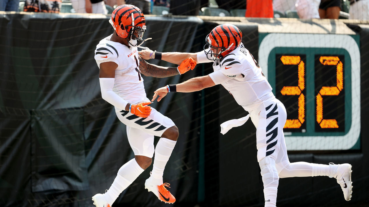 CINCINNATI, OHIO - SEPTEMBER 12: Ja'Marr Chase #1 of the Cincinnati Bengals celebrates with Joe Burrow #9 after a 50-yard touchdown reception during the second quarter against the Minnesota Vikings at Paul Brown Stadium on September 12, 2021 in Cincinnati, Ohio.