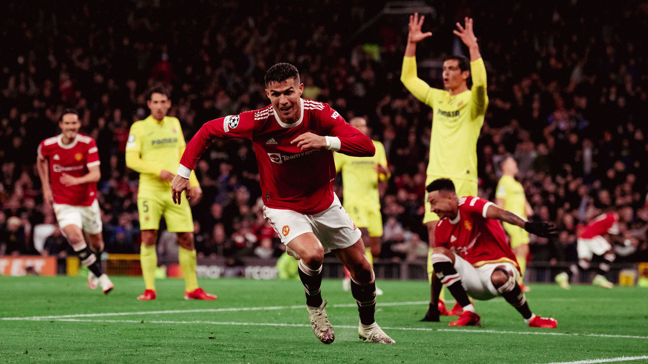 MANCHESTER, ENGLAND - SEPTEMBER 29: Cristiano Ronaldo of Manchester United celebrates scoring a goal to make the 2-1 during the UEFA Champions League group F match between Manchester United and Villarreal CF at Old Trafford on September 29, 2021 in Manchester, United Kingdom.