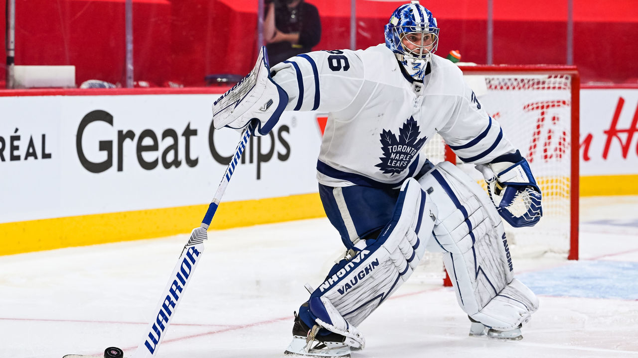 MONTREAL, QC - MAY 29: Toronto Maple Leafs goalie Jack Campbell (36) intercepts the puck during the NHL Stanley Cup Playoffs first round game 6 between the Toronto Maple Leafs versus the Montreal Canadiens on May 29, 2021, at Bell Centre in Montreal, QC