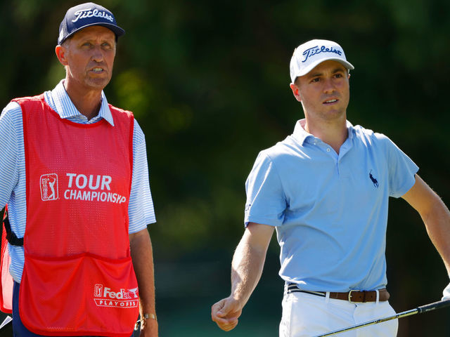 ATLANTA, GEORGIA - SEPTEMBER 07: Justin Thomas of the United States talks with his caddie Jim "Bones" Mackay 0n the 11th tee during the final round of the TOUR Championship at East Lake Golf Club on September 07, 2020 in Atlanta, Georgia.