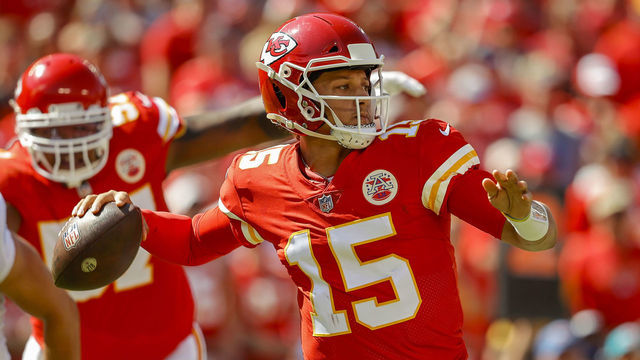 KANSAS CITY, MO - SEPTEMBER 26: Patrick Mahomes #15 of the Kansas City Chiefs readies to throw a second quarter pass against the Los Angeles Chargers during the second quarter at Arrowhead Stadium on September 26, 2021 in Kansas City, Missouri.