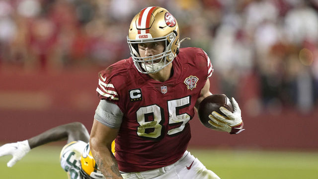 SANTA CLARA, CALIFORNIA - SEPTEMBER 26: George Kittle #85 of the San Francisco 49ers runs with the ball after catching a pass against the Green Bay Packers during the fourth quarter in the game at Levi's Stadium on September 26, 2021 in Santa Clara, California.