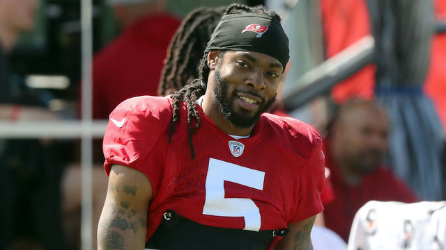 TAMPA, FL - SEP 29: Newly signed Tampa Bay Buccaneers defensive back Richard Sherman (5) smiles during the Tampa Bay Buccaneers work out on September 29, 2021 at the AdventHealth Training Center at One Buccaneer Place in Tampa, Florida.