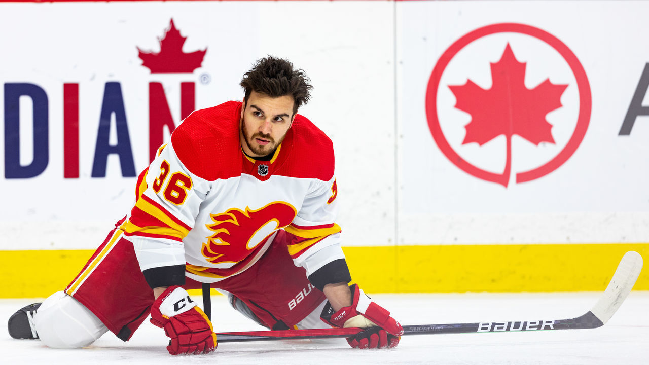 OTTAWA, ON - MARCH 01: Calgary Flames Left Wing Zac Rinaldo (36) stretches during warm-up before National Hockey League action between the Calgary Flames and Ottawa Senators on March 1, 2021, at Canadian Tire Centre in Ottawa, ON, Canada.