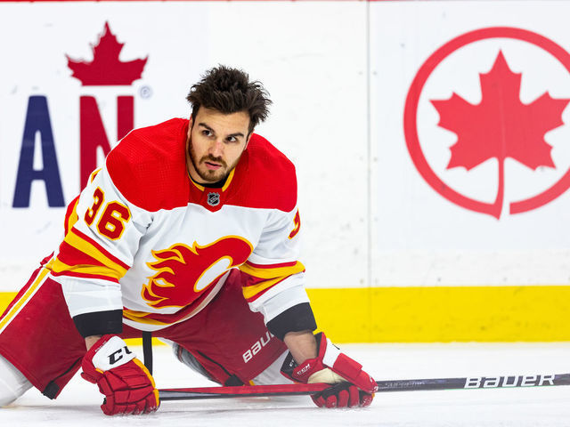 OTTAWA, ON - MARCH 01: Calgary Flames Left Wing Zac Rinaldo (36) stretches during warm-up before National Hockey League action between the Calgary Flames and Ottawa Senators on March 1, 2021, at Canadian Tire Centre in Ottawa, ON, Canada.