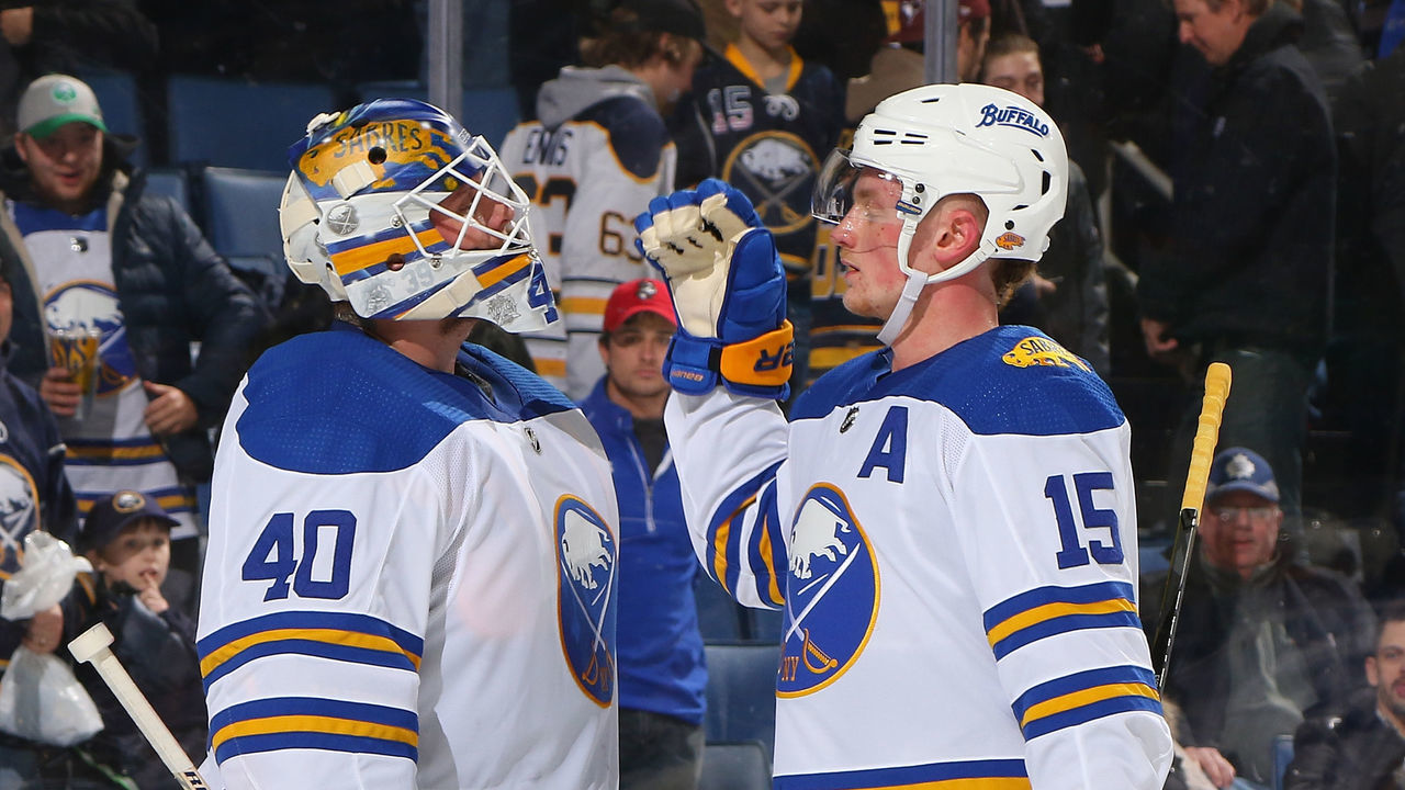 BUFFALO, NY - FEBRUARY 8: Robin Lehner #40 and Jack Eichel #15 of the Buffalo Sabres celebrate their 4-3 victory against the New York Islanders during an NHL game on February 8, 2018 at KeyBank Center in Buffalo, New York.