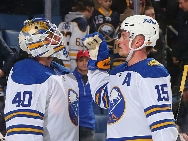BUFFALO, NY - FEBRUARY 8: Robin Lehner #40 and Jack Eichel #15 of the Buffalo Sabres celebrate their 4-3 victory against the New York Islanders during an NHL game on February 8, 2018 at KeyBank Center in Buffalo, New York.