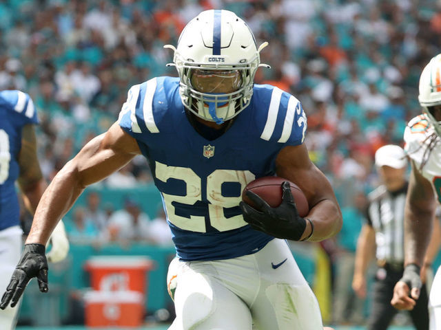 MIAMI GARDENS, FLORIDA - OCTOBER 03: Jonathan Taylor #28 of the Indianapolis Colts runs the ball during the second quarter in the game against the Miami Dolphins at Hard Rock Stadium on October 03, 2021 in Miami Gardens, Florida.