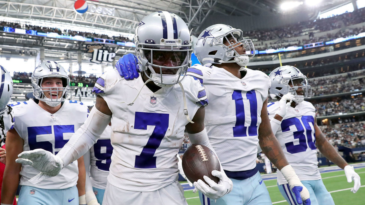 ARLINGTON, TEXAS - OCTOBER 03: Trevon Diggs #7 of the Dallas Cowboys celebrates after an interception during the third quarter against the Carolina Panthers at AT&T Stadium on October 03, 2021 in Arlington, Texas.