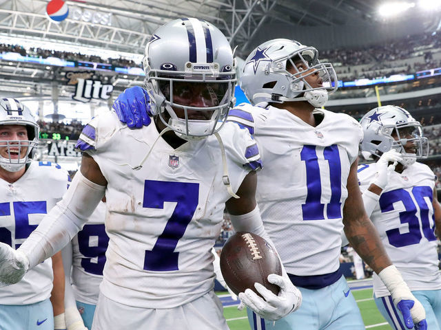 ARLINGTON, TEXAS - OCTOBER 03: Trevon Diggs #7 of the Dallas Cowboys celebrates after an interception during the third quarter against the Carolina Panthers at AT&T Stadium on October 03, 2021 in Arlington, Texas.