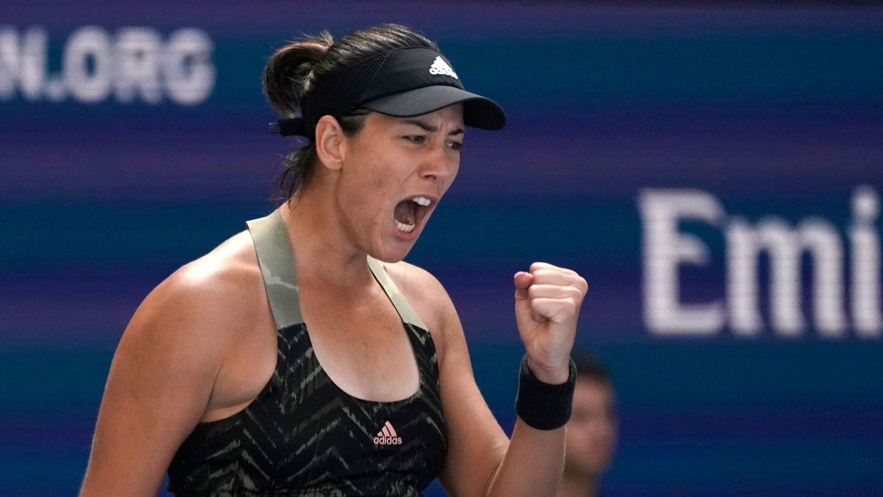 Spain's Garbine Muguruza celebrates during her 2021 US Open Tennis tournament women's singles third round match against Belarus' Victoria Azarenka at the USTA Billie Jean King National Tennis Center in New York, on September 3, 2021.