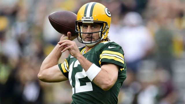 GREEN BAY, WISCONSIN - OCTOBER 03: Aaron Rodgers #12 of the Green Bay Packers throws the ball during pregame against the Pittsburgh Steelers at Lambeau Field on October 03, 2021 in Green Bay, Wisconsin.