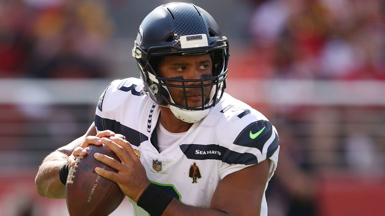 SANTA CLARA, CALIFORNIA - OCTOBER 03: Russell Wilson #3 of the Seattle Seahawks looks to throw the ball during the third quarter against the San Francisco 49ers at Levi's Stadium on October 03, 2021 in Santa Clara, California.