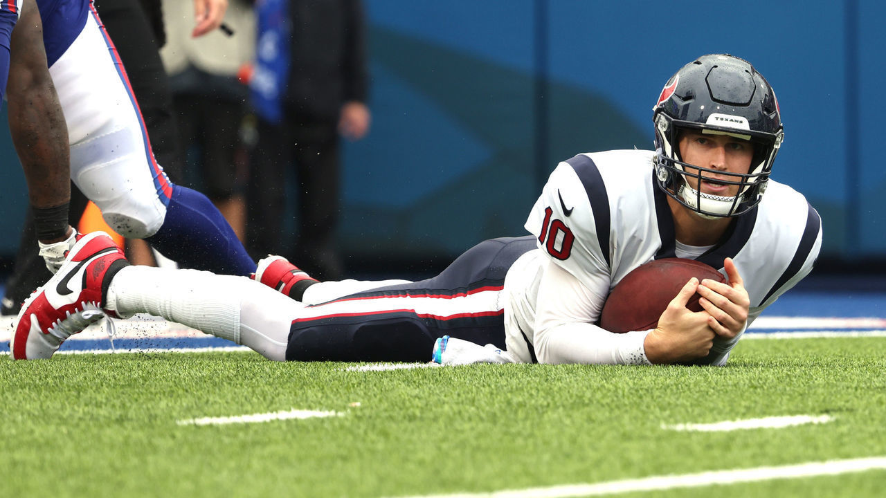 ORCHARD PARK, NEW YORK - OCTOBER 03: Quarterback Davis Mills #10 of the Houston Texans reacts after being sacked by the Buffalo Bills in second quarter at Highmark Stadium on October 03, 2021 in Orchard Park, New York.