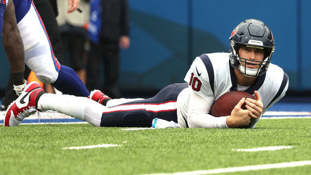 ORCHARD PARK, NEW YORK - OCTOBER 03: Quarterback Davis Mills #10 of the Houston Texans reacts after being sacked by the Buffalo Bills in second quarter at Highmark Stadium on October 03, 2021 in Orchard Park, New York.