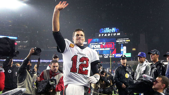 Foxborough, MA - October 3: Tom Brady waves to cheering fans as he leaves the field following the Bucs victory. The New England Patriots host the Tampa Bay Buccaneers in a regular season NFL game at Gillette Stadium in Foxborough, MA on Sunday, Oct. 3, 2021.