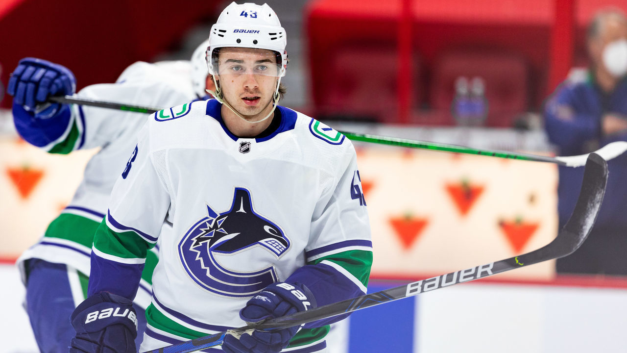 OTTAWA, ON - APRIL 28: Vancouver Canucks Defenceman Quinn Hughes (43) during warm-up before National Hockey League action between the Vancouver Canucks and Ottawa Senators on April 28, 2021, at Canadian Tire Centre in Ottawa, ON, Canada.
