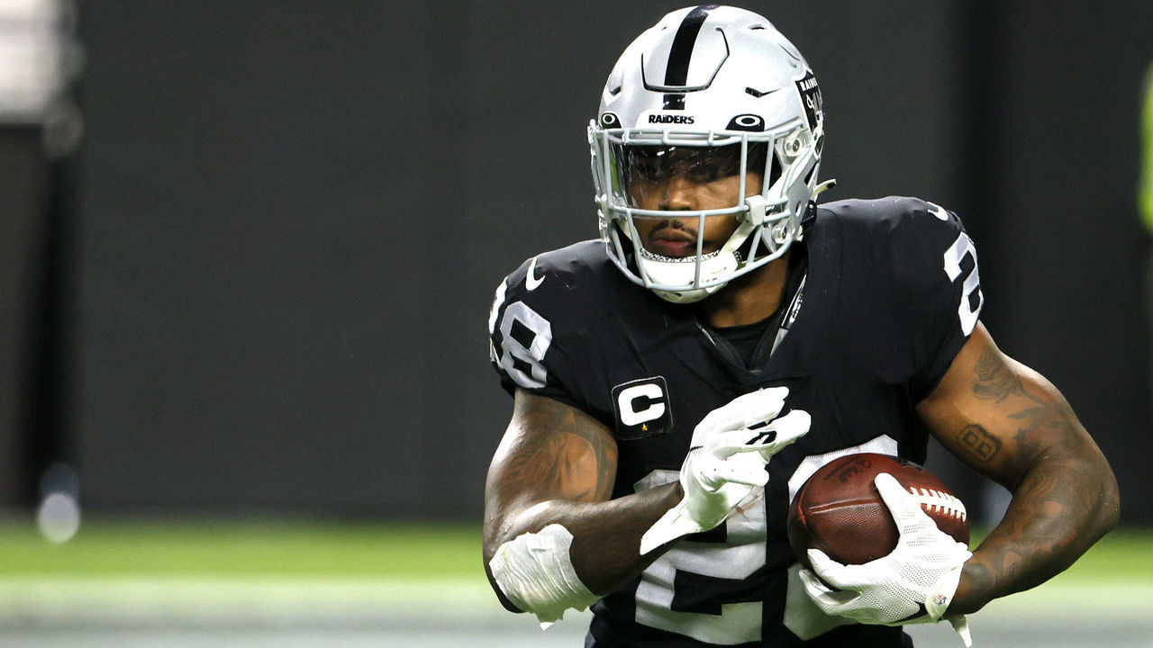 LAS VEGAS, NEVADA - SEPTEMBER 13: Running back Josh Jacobs #28 of the Las Vegas Raiders runs against the Baltimore Ravens during their game at Allegiant Stadium on September 13, 2021 in Las Vegas, Nevada. The Raiders defeated the Ravens 33-27 in overtime.