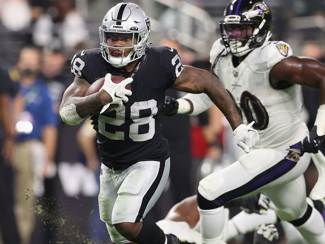 LAS VEGAS, NEVADA - SEPTEMBER 13: Running back Josh Jacobs #28 of the Las Vegas Raiders rushes the football against the Baltimore Ravens during the NFL game at Allegiant Stadium on September 13, 2021 in Las Vegas, Nevada. The Raiders defeated the Ravens 33-27 in overtime.