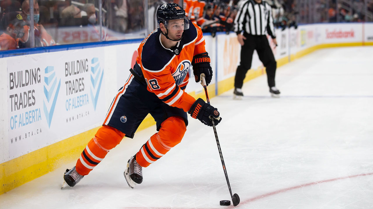 EDMONTON, AB - SEPTEMBER 28: Zach Hyman #18 of the Edmonton Oilers skates against the Seattle Kraken at Rogers Place during second period preseason action on September 28, 2021 in Edmonton, Canada.
