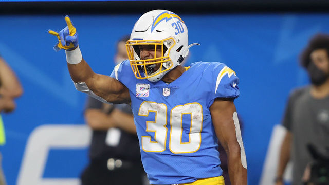 INGLEWOOD, CALIFORNIA - OCTOBER 04: Running back Austin Ekeler #30 of the Los Angeles Chargers celebrates his touchdown against the Las Vegas Raiders during the fourth quarter at SoFi Stadium on October 4, 2021 in Inglewood, California.