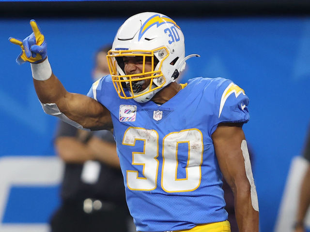 INGLEWOOD, CALIFORNIA - OCTOBER 04: Running back Austin Ekeler #30 of the Los Angeles Chargers celebrates his touchdown against the Las Vegas Raiders during the fourth quarter at SoFi Stadium on October 4, 2021 in Inglewood, California.