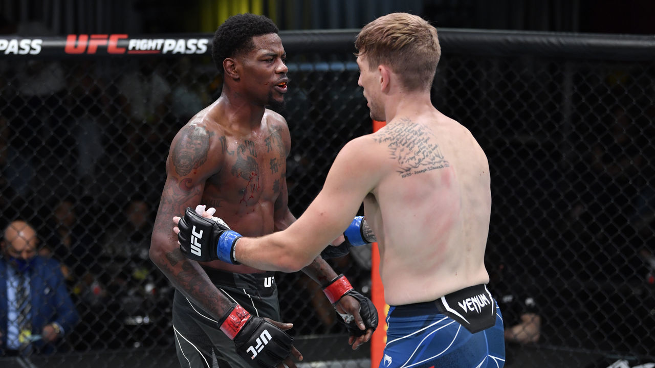 LAS VEGAS, NEVADA - OCTOBER 02: (L-R) Kevin Holland and Kyle Daukaus interact after their middleweight bout is ruled a no-contest due to an accidental headbutt during the UFC Fight Night event at UFC APEX on October 02, 2021 in Las Vegas, Nevada.