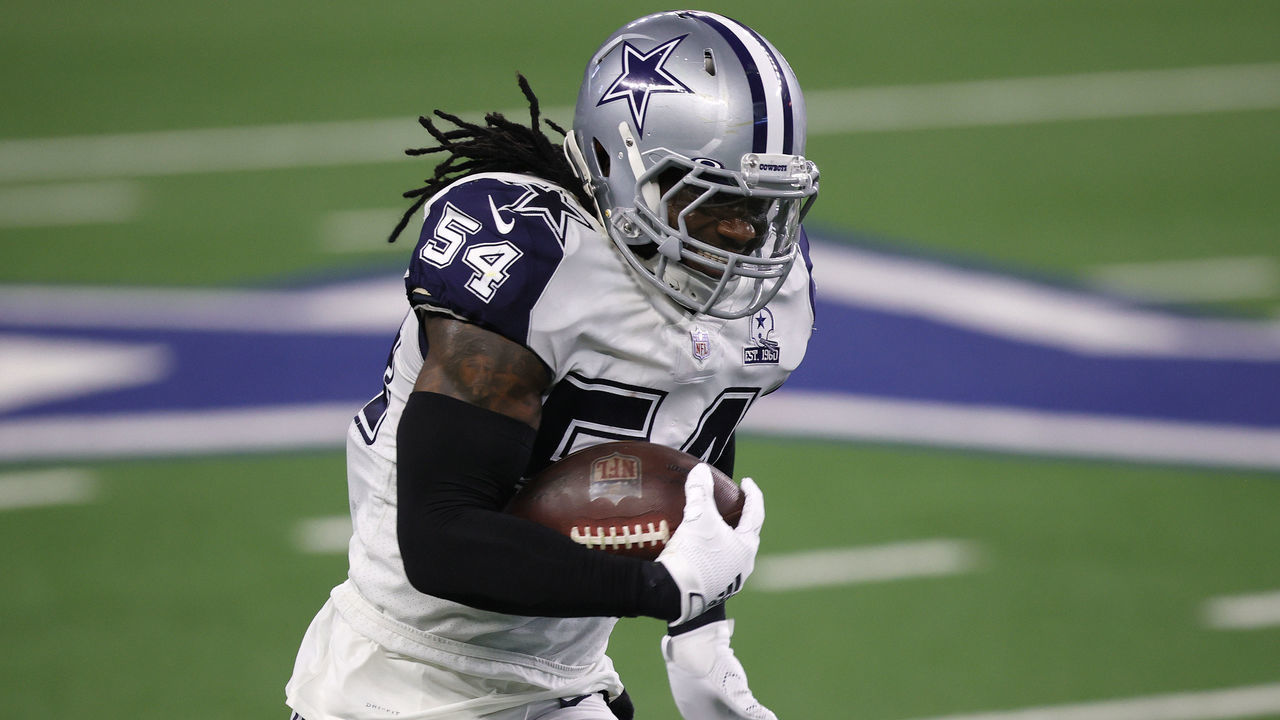 ARLINGTON, TEXAS - NOVEMBER 26: Jaylon Smith #54 of the Dallas Cowboys rushes following his interception during the third quarter of a game against the Washington Football Team at AT&T Stadium on November 26, 2020 in Arlington, Texas.