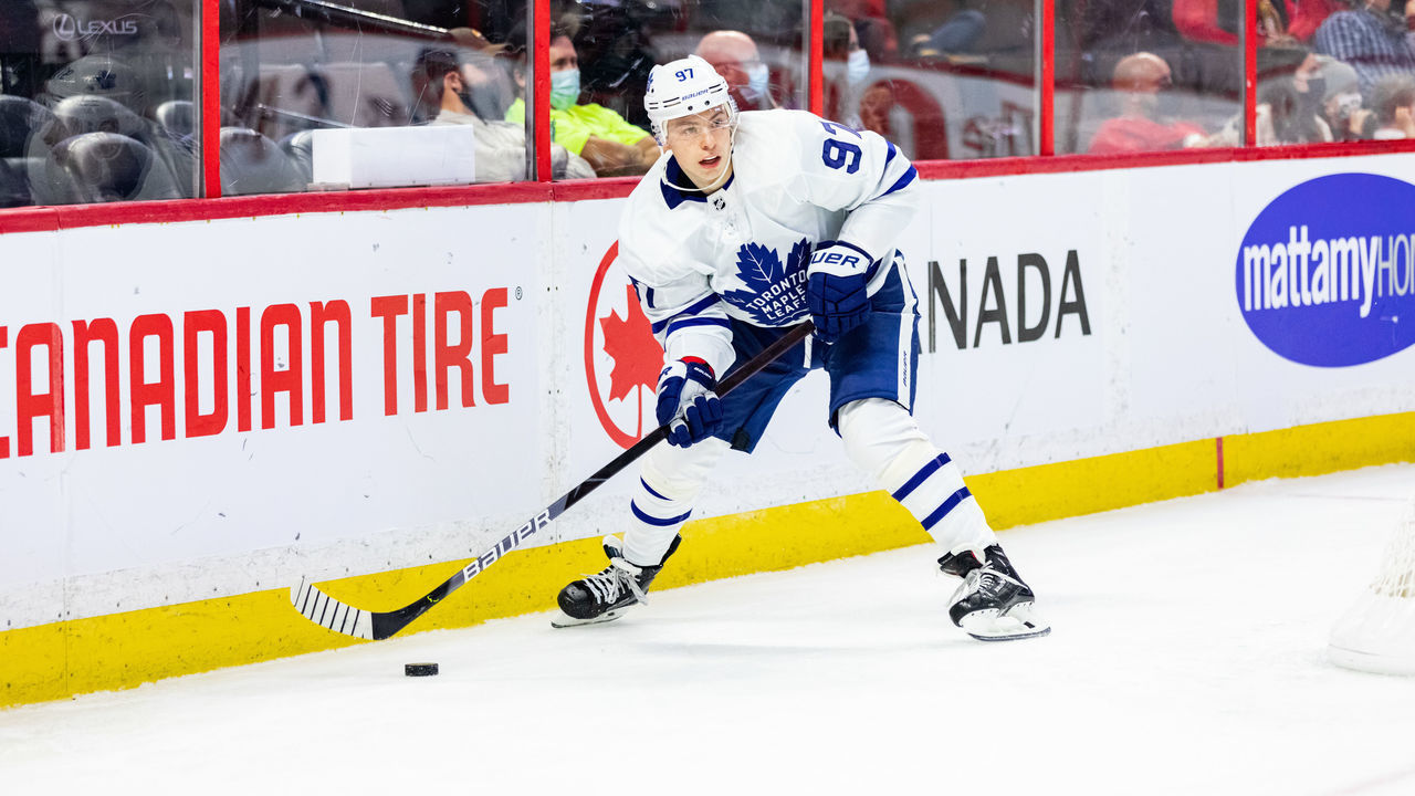 OTTAWA, ON - SEPTEMBER 29: Toronto Maple Leafs left wing Nikita Gusev (97) skates the puck around the net during third period National Hockey League preseason action between the Toronto Maple Leafs and Ottawa Senators on September 29, 2021, at Canadian Tire Centre in Ottawa, ON, Canada.