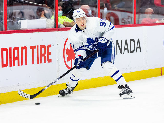 OTTAWA, ON - SEPTEMBER 29: Toronto Maple Leafs left wing Nikita Gusev (97) skates the puck around the net during third period National Hockey League preseason action between the Toronto Maple Leafs and Ottawa Senators on September 29, 2021, at Canadian Tire Centre in Ottawa, ON, Canada.