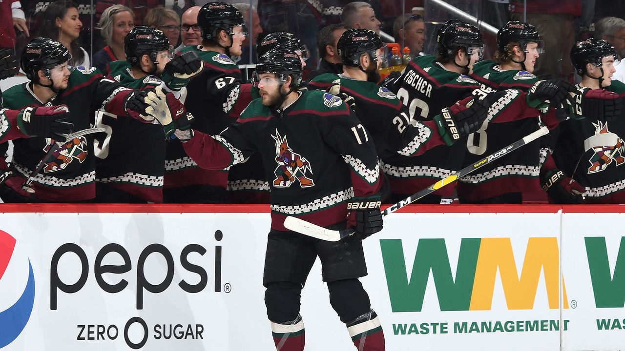 GLENDALE, AZ - APRIL 06: Alex Galchenyuk #17 of the Arizona Coyotes is congratulated by teammates after scoring a goal against the Winnipeg Jets during the first period at Gila River Arena on April 6, 2019 in Glendale, Arizona.