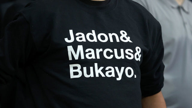 WEST BROMWICH, ENGLAND - AUGUST 25: A fan wearing a shirt bearing the names of Jadon Sancho, Marcus Rashford and Bukayo Saka during the Carabao Cup Second Round between West Bromwich Albion and Arsenal at The Hawthorns on August 25, 2021 in West Bromwich, England.