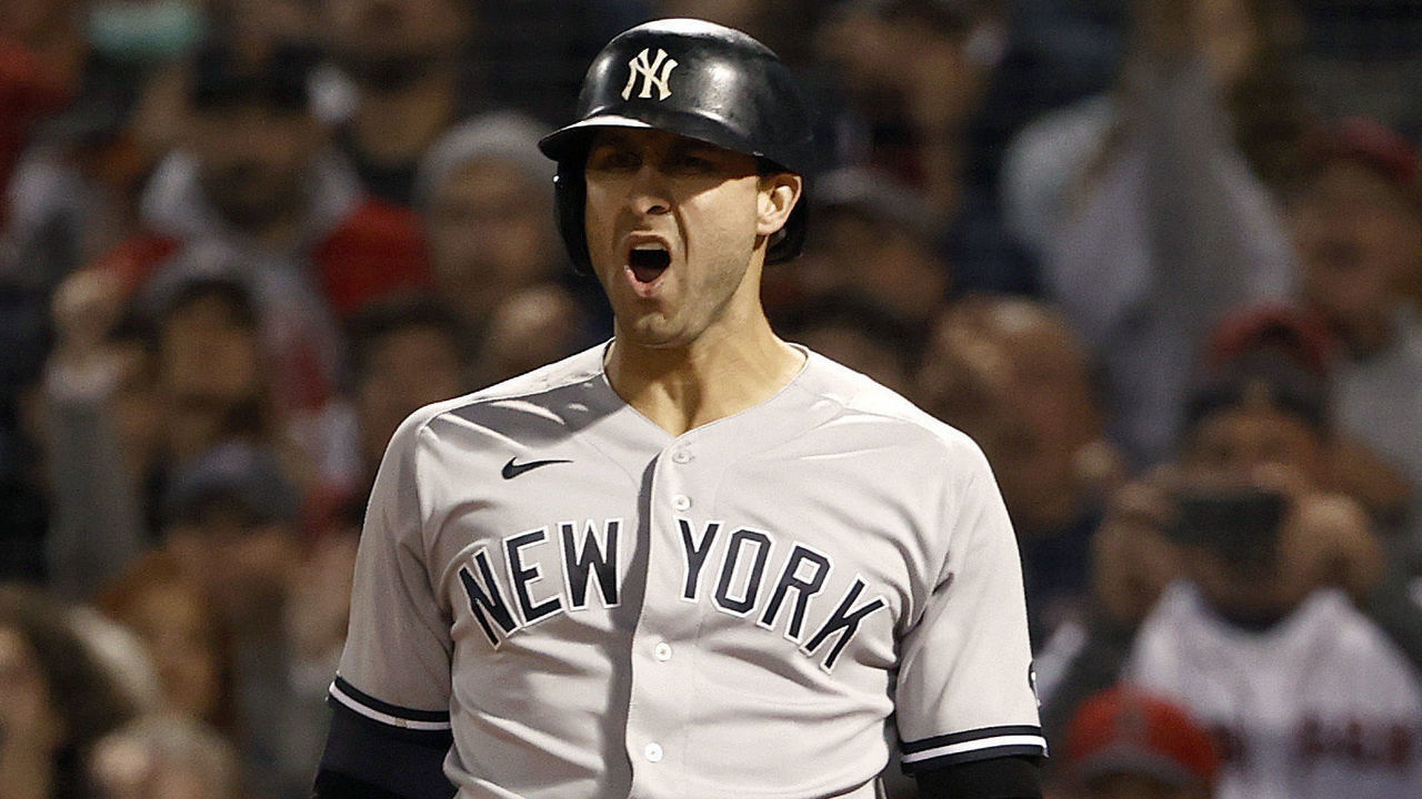 BOSTON, MASSACHUSETTS - OCTOBER 05: Joey Gallo #13 of the New York Yankees reacts after striking out against the Boston Red Sox during the first inning of the American League Wild Card game at Fenway Park on October 05, 2021 in Boston, Massachusetts.