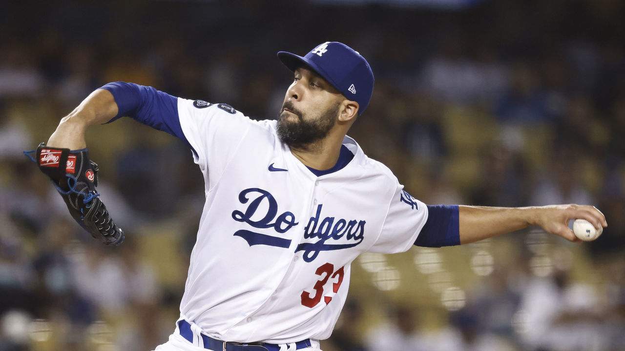 LOS ANGELES, CALIFORNIA - OCTOBER 02: David Price #33 of the Los Angeles Dodgers pitches against the Milwaukee Brewers during the ninth inning at Dodger Stadium on October 02, 2021 in Los Angeles, California.