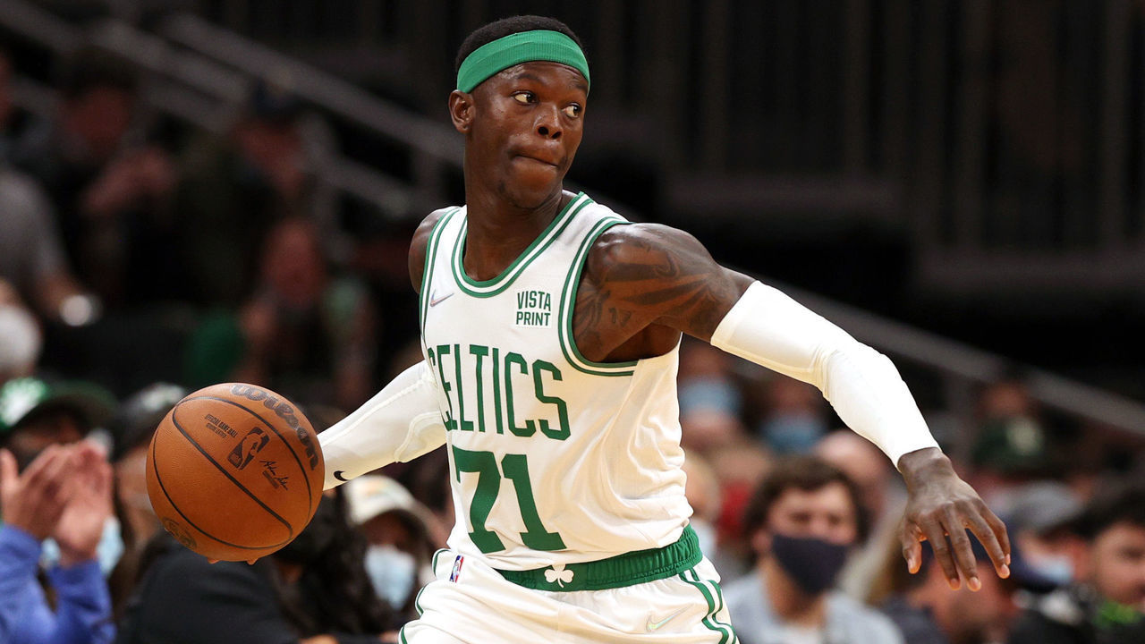 BOSTON, MASSACHUSETTS - OCTOBER 04: Dennis Schroder #71 of the Boston Celtics makes a pass against the Orlando Magic during the first quarter of the preseason game at TD Garden on October 04, 2021 in Boston, Massachusetts.