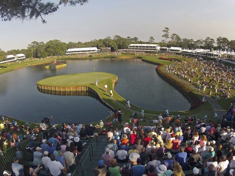 VIDEO Caddies take aim on 17 at Sawgrass
