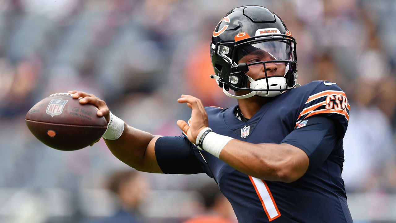 CHICAGO, ILLINOIS - OCTOBER 03: Quarterback Justin Fields #1 of the Chicago Bears warms up before a game against the Detroit Lions at Soldier Field on October 03, 2021 in Chicago, Illinois.