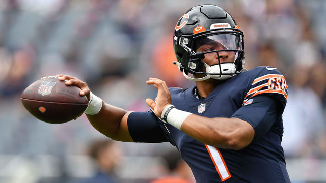 CHICAGO, ILLINOIS - OCTOBER 03: Quarterback Justin Fields #1 of the Chicago Bears warms up before a game against the Detroit Lions at Soldier Field on October 03, 2021 in Chicago, Illinois.