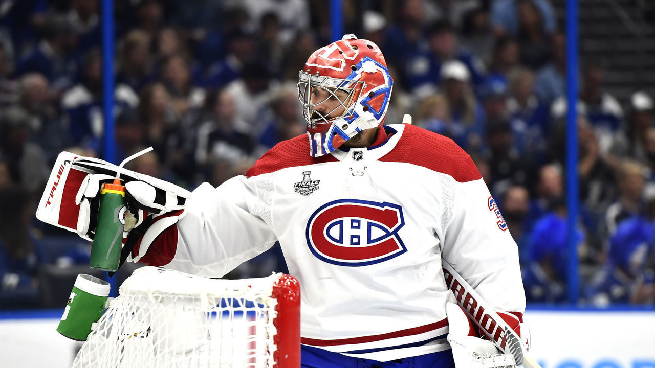 TAMPA, FLORIDA - JULY 07: Goaltender Carey Price #31 of the Montreal Canadiens grabs for his water bottle in the third period of Game Five of the 2021 Stanley Cup Final against the Tampa Bay Lightning at Amalie Arena on July 07, 2021 in Tampa, Florida.