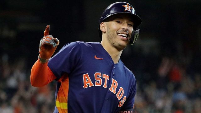 HOUSTON, TEXAS - OCTOBER 03: Carlos Correa #1 of the Houston Astros hits a home run in the eighth inning against the Oakland Athletics at Minute Maid Park on October 03, 2021 in Houston, Texas.