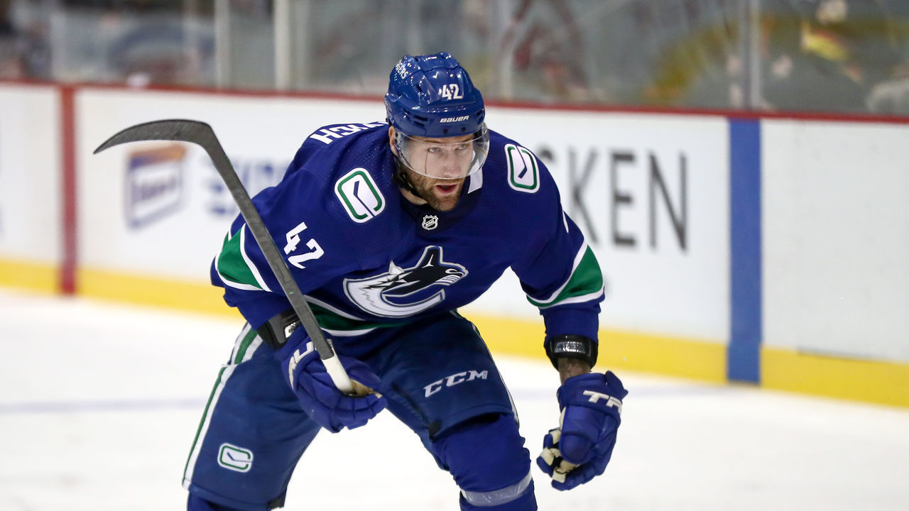 ABBOTSFORD, BC - SEPTEMBER 27: Vancouver Canucks Left Wing Jonah Gadjovich (42) skates down the ice while playing the Calgary Flames during their NHL preseason game at the Abbotsford Entertainment and Sports Centre on September 27, 2021 in Abbotsford, British Columbia, Canada.