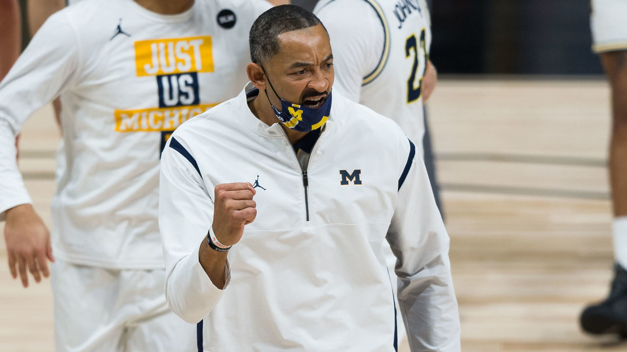 INDIANAPOLIS, IN - MARCH 12: Michigan Wolverines head coach Juwan Howard celebrates leaving the floor for halftime during the men's Big Ten tournament college basketball game between the Maryland Terrapins and Michigan Wolverines on March 12, 2021, at Lucas Oil Stadium in Indianapolis, IN.