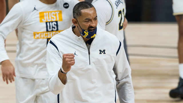 INDIANAPOLIS, IN - MARCH 12: Michigan Wolverines head coach Juwan Howard celebrates leaving the floor for halftime during the men's Big Ten tournament college basketball game between the Maryland Terrapins and Michigan Wolverines on March 12, 2021, at Lucas Oil Stadium in Indianapolis, IN.