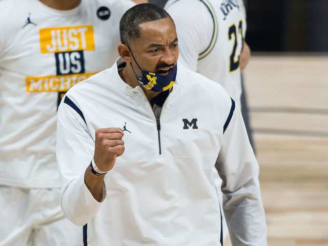 INDIANAPOLIS, IN - MARCH 12: Michigan Wolverines head coach Juwan Howard celebrates leaving the floor for halftime during the men's Big Ten tournament college basketball game between the Maryland Terrapins and Michigan Wolverines on March 12, 2021, at Lucas Oil Stadium in Indianapolis, IN.