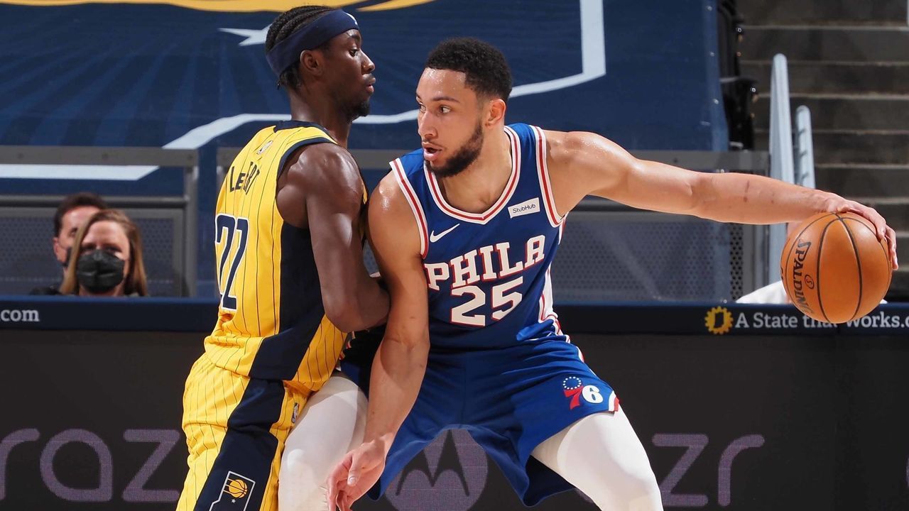 INDIANAPOLIS, IN - MAY 11: Caris LeVert #22 of the Indiana Pacers plays defense on Ben Simmons #25 of the Philadelphia 76ers during the game on May 11, 2021 at Bankers Life Fieldhouse in Indianapolis, Indiana. Mandatory Copyright Notice: Copyright 2021 NBAE