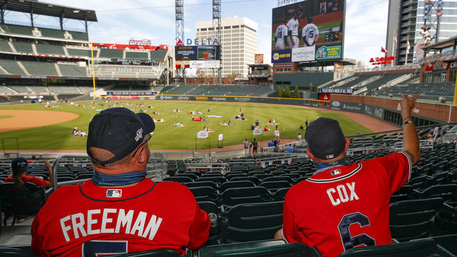 ATLANTA, GA - OCTOBER 08: Atlanta Braves fans watch Game Three of the National League Division Series between the Miami Marlins and Atlanta Braves at Truist Park on October 8, 2020 in Atlanta, Georgia.