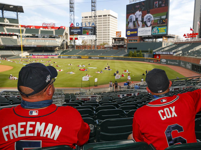 ATLANTA, GA - AUGUST 20: Fans stand in line to order custom Braves