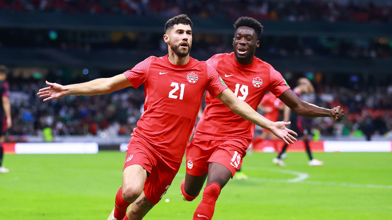 MEXICO CITY, MEXICO - OCTOBER 07: Jonathan Osorio of Canada celebrates with teammates after scoring the first goal of his team during the match between Mexico and Canada as part of the Concacaf 2022 FIFA World Cup Qualifier at Azteca Stadium on October 07, 2021 in Mexico City, Mexico.